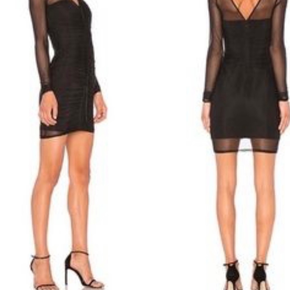 CINQ A SEPT BLACK DRESS. NEVER BEEN WORN. Size 0